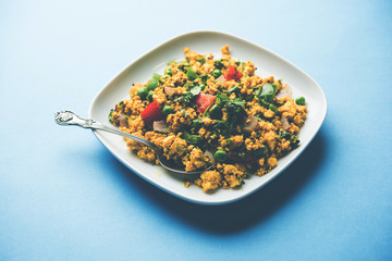 Paneer Bhurji, mildly spiced cottage cheese scramble and served with roti or laccha paratha, selective focus