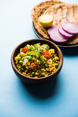 Paneer Bhurji, mildly spiced cottage cheese scramble and served with roti or laccha paratha, selective focus