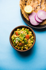 Paneer Bhurji, mildly spiced cottage cheese scramble and served with roti or laccha paratha, selective focus