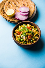 Paneer Bhurji, mildly spiced cottage cheese scramble and served with roti or laccha paratha, selective focus