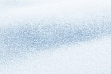 Fresh snow background texture. Winter background with snowflakes and snow mounds. Snow lumps.