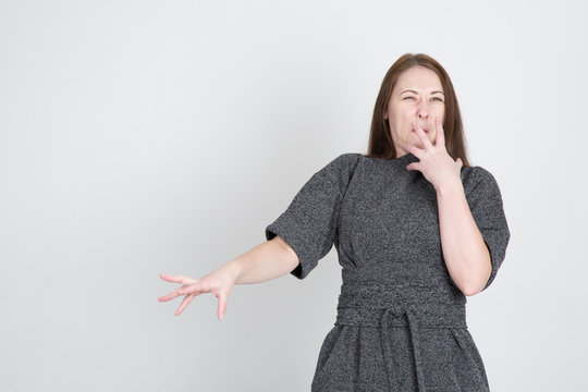   young woman contemptuously repulsive of something