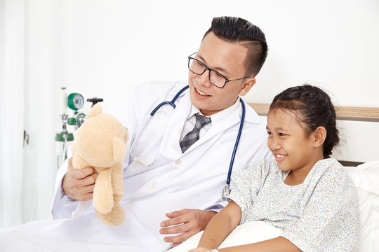 Little Girl And Doctor In Hospital