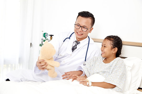 Little Girl And Doctor In Hospital