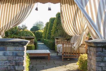 modern gazebo in cottage garden