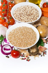 brown rice and quinoa and ingredients for soup, vertical top view