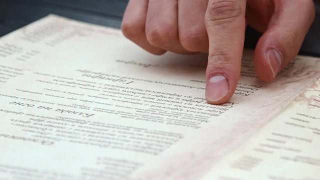 4K Detail shot of a menu in a cafe