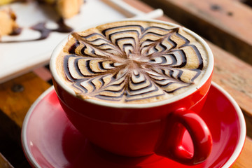 Hot coffee in red cup