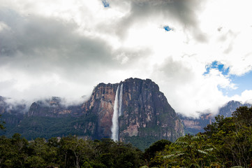dramatic view from distance of angel falls in venezuela canaima park with dark moody cloudy sky