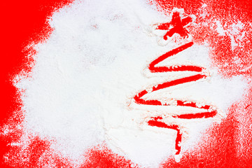 Christmas tree with snow on red Background.