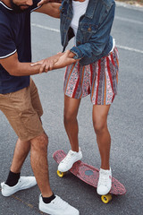 supporting girlfriend on skateboard couple goals