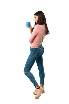 A Full-length Shot Of A Teenager Girl With Pink Shirt Holding A Hot Cup Of Coffee