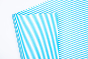 elevated view of striped paper isolated on white
