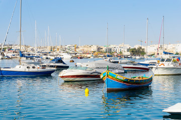 Fototapeta premium VALLETTA, MALTA - June 28, 2017: Typical Seaside port in Valletta in Malta