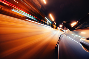 Car on the road with motion blur background.
