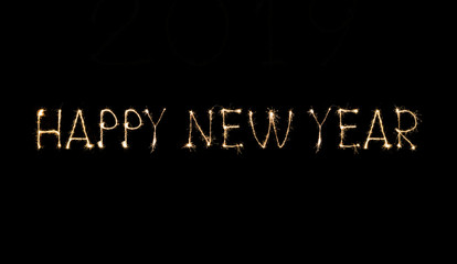 Happy New Year text handmade written sparkles fireworks