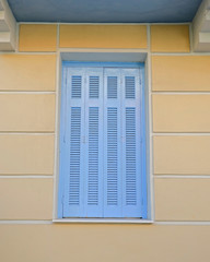 light blue french style window shutters closeup