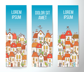 Fototapeta premium Banners with cartoon doodle houses on blue background.