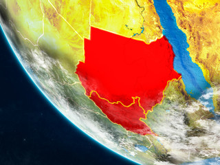 Former Sudan on planet Earth from space with country borders. Very fine detail of planet surface and clouds.