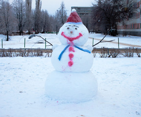 Snow sculpture, snowman in winter in Russia. Human creativity.