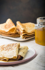 delicious thin pancakes with honey