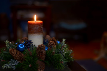 Christmas and New Year background with candle and other decorations