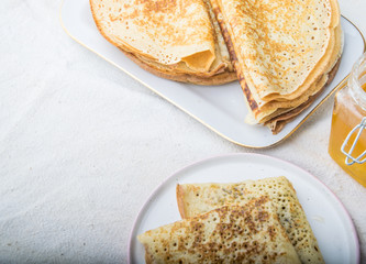 stack of pancakes and nastural honey