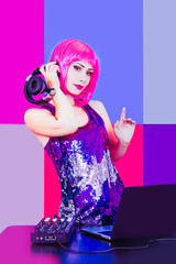 Portrait dj headphone plays equipment disco girl party retro vintage plastic pink proton purple red...