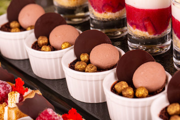 A chocolate dessert with milk chocolate and chocolate meringue