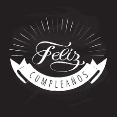 Vector_Composition with lettering “Feliz cumpleaños» and decor for printing on a greeting card, poster, banner or digital greeting.