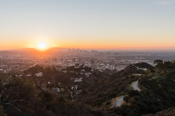 Sunrise cityscape view towards Hollywood and downtown Los Angeles from Runyon Canyon Park in the...