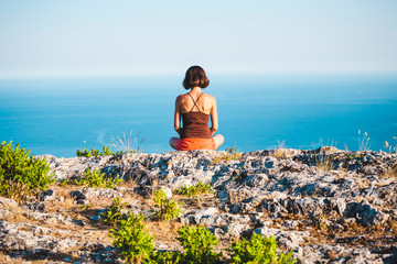 Girl at the top of the mountain.