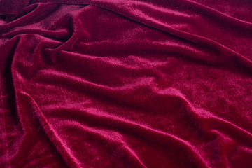 Fototapeta na wymiar Red velvet fabric background texture.