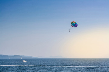 Fototapeta na wymiar Parachute sailing