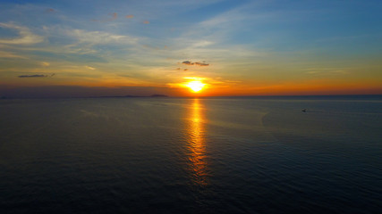 Naklejka premium aerial image from drone of an stunning beautiful sea sunset with turquoise water with copy space for your text.Beautiful Sand beach with turquoise water,aerial UAV drone shot