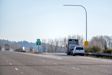 Police stopped big rig semi truck for inspection on the highway exit © vit