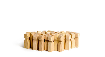 A crowd of people on a white background. Many wooden figures of people. The concept of gregarious feelings, the segmentation of consumers and customers, the study of crowd behavior. Statistics