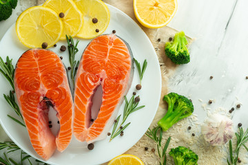 Fresh fish, salmon steaks with vegetables. Flat-lay. Top view, tasty and healthy food