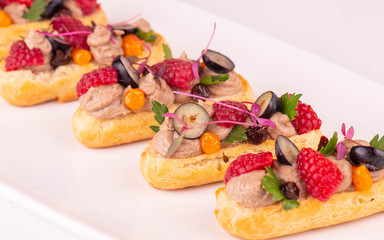 Vegetable bruschetta with paste and fresh berries
