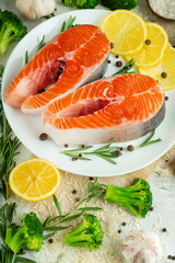 Delicious fresh fish steaks, salmon, trout. With vegetables, deli, vegan food, diet and Dotex