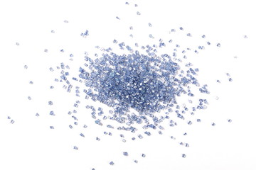 Blue crystal sugar sprinkles for cake, ice cream and pastries isolated on white background, top view