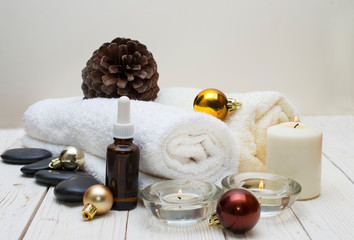Fototapeta na wymiar spa concept, wellness objects on wood plant , christmas background. Present holiday