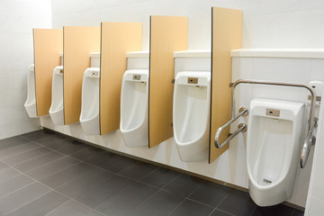 clean and modern public men toilet with friendly design for people with disability or elderly,...