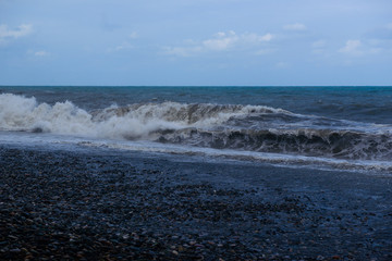 Stormy sea waves breaking near the coast