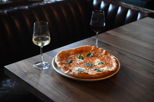 Pizza and wine - Powered by Adobe