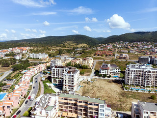 Fototapeta premium aerial shooting of the resort in Sveti Vlas, sea view and hotel residential buildings with swimming pools