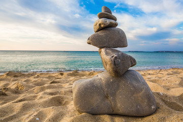 Stone cairn at the beach, concept of balance