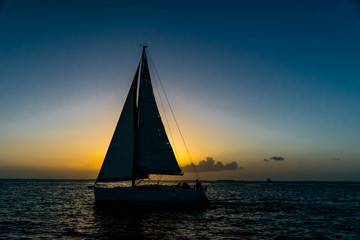 Fototapeta na wymiar Sail boat and Sunset
