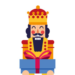 christmas nutcracker holding gift box