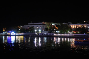 Fototapeta na wymiar City of Sevastopol embankment view by night, Crimea, Russia